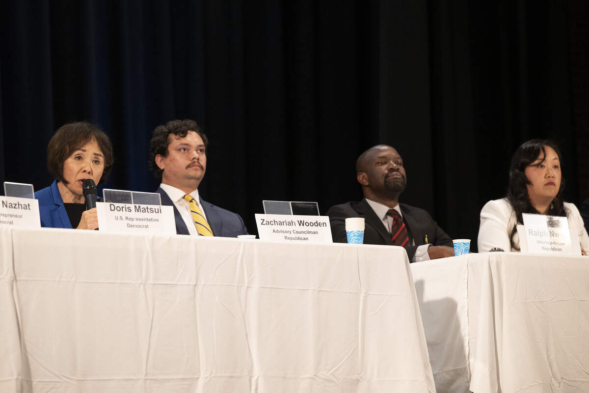 U.S. Rep. Doris Matsui, left, speaks during a congressional candidate forum for the 7th Congressional District at Coloma Center in Sacramento on April 2 as candidates, from left, Zachariah Wooden, Ralph Nwobi and Mai Vang listen.